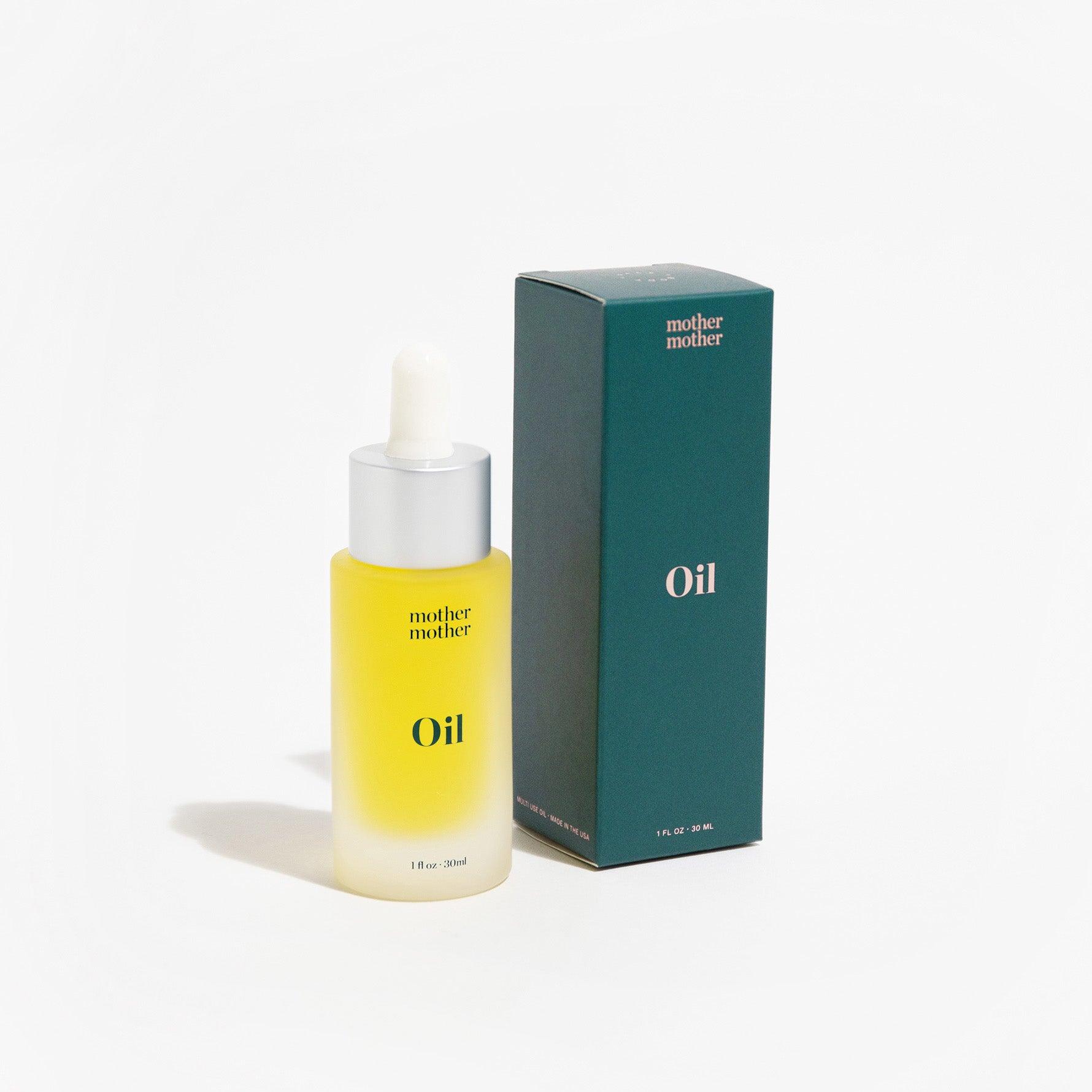 Mother Mother Face & Body Oil next to a green box on a white background