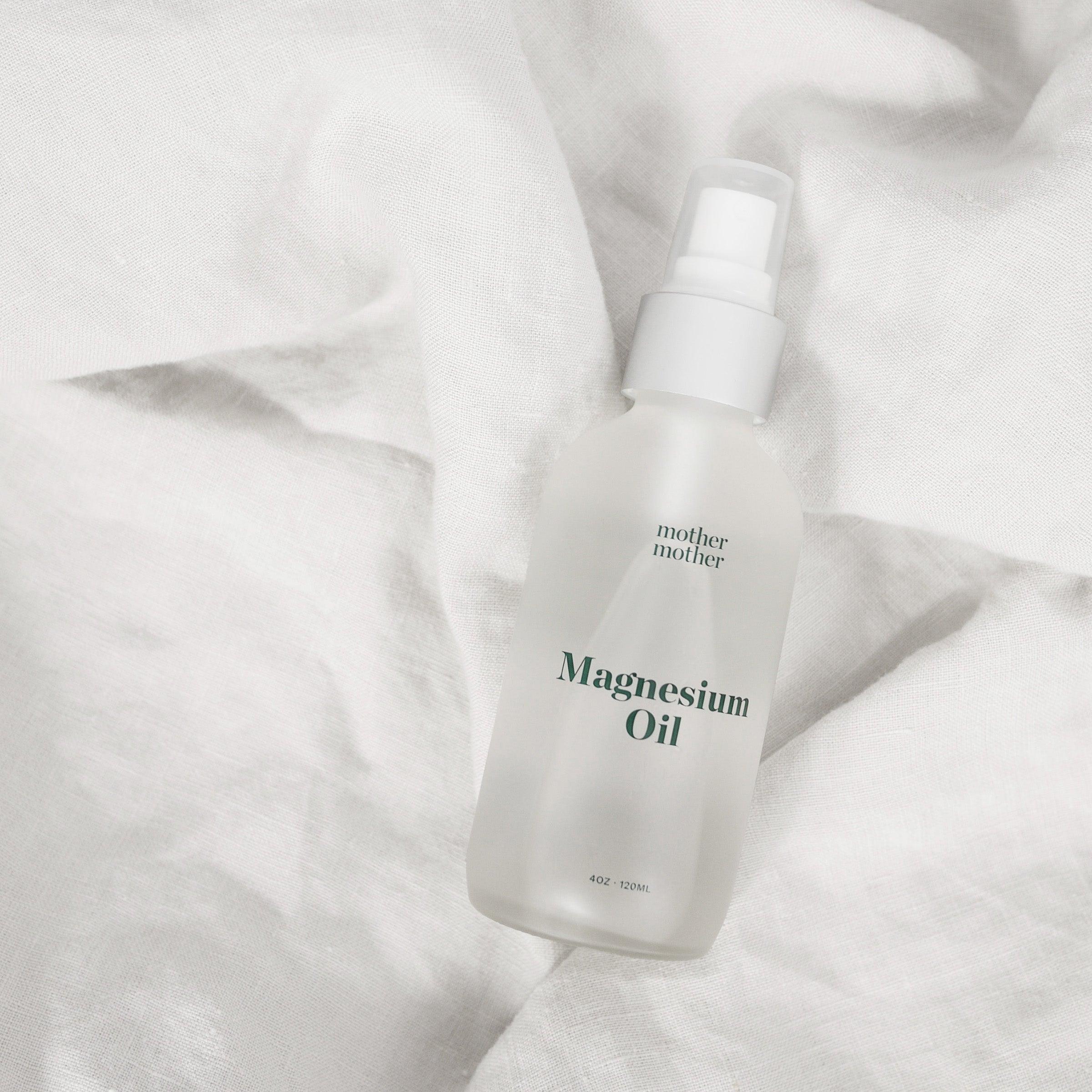 magnesium oil, essential pregnancy self-care on linen
